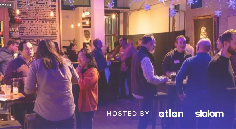 Industry executives mingling at an evening dinner hosted by Atlan and Slalom.